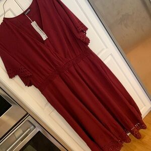 Bloomchic red wine dress. Pretty cut out details on sleeves and hem. NWT.sz18-20